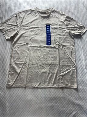 Calvin Klein White Short-Sleeve Tee with Vertical Blue Logo Strip